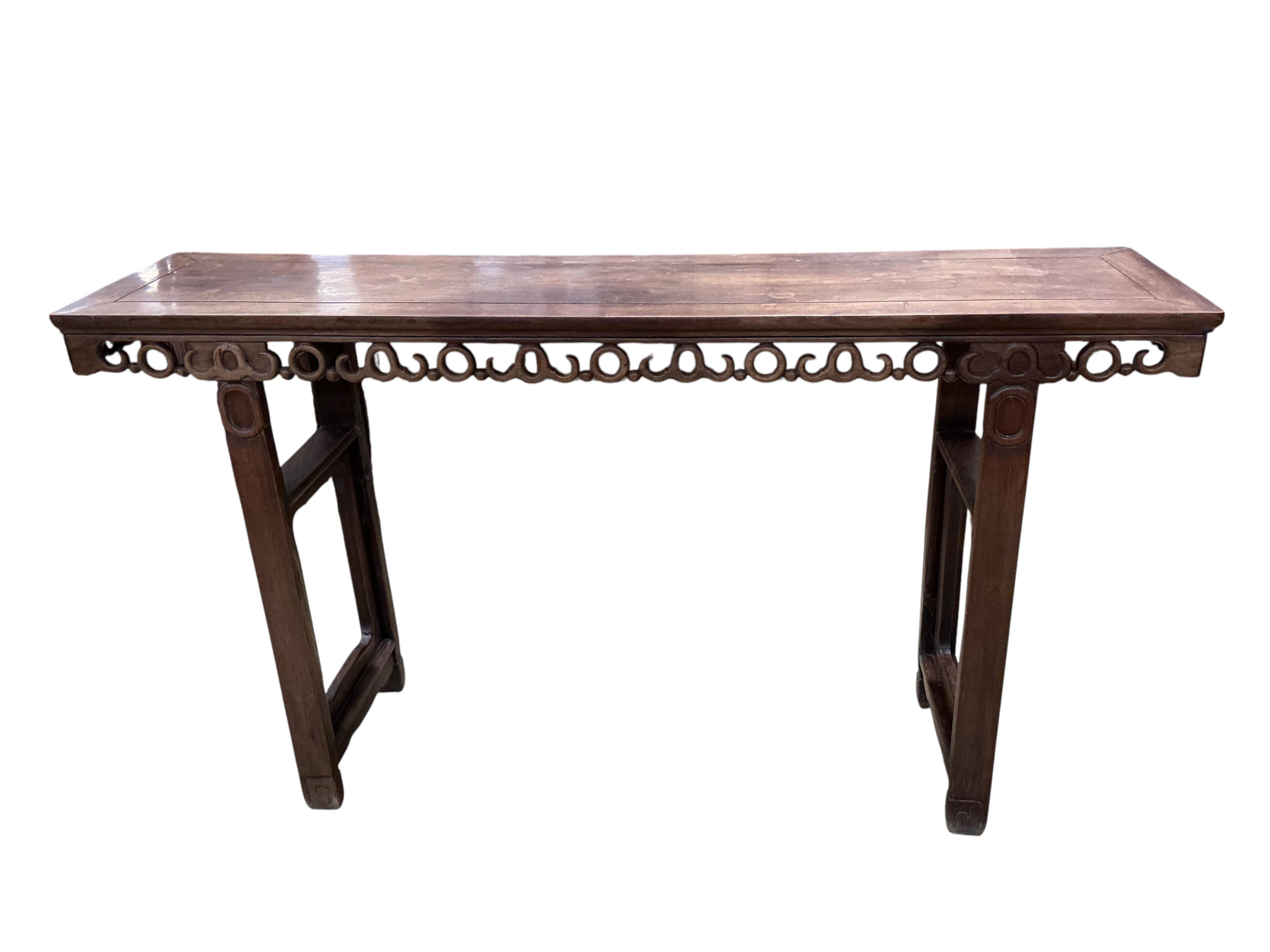 A Chinese altar table, width 181cm, depth 45cm, height 101cm